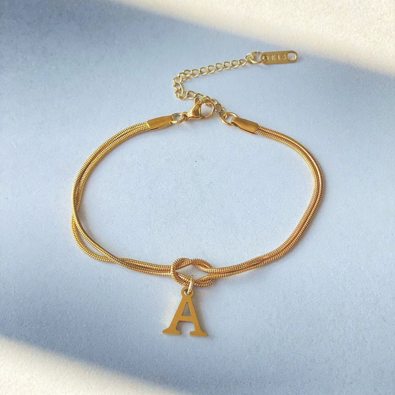 Gold Love Knot Initial bracelet, Elegant Stainless steel chain jewelry