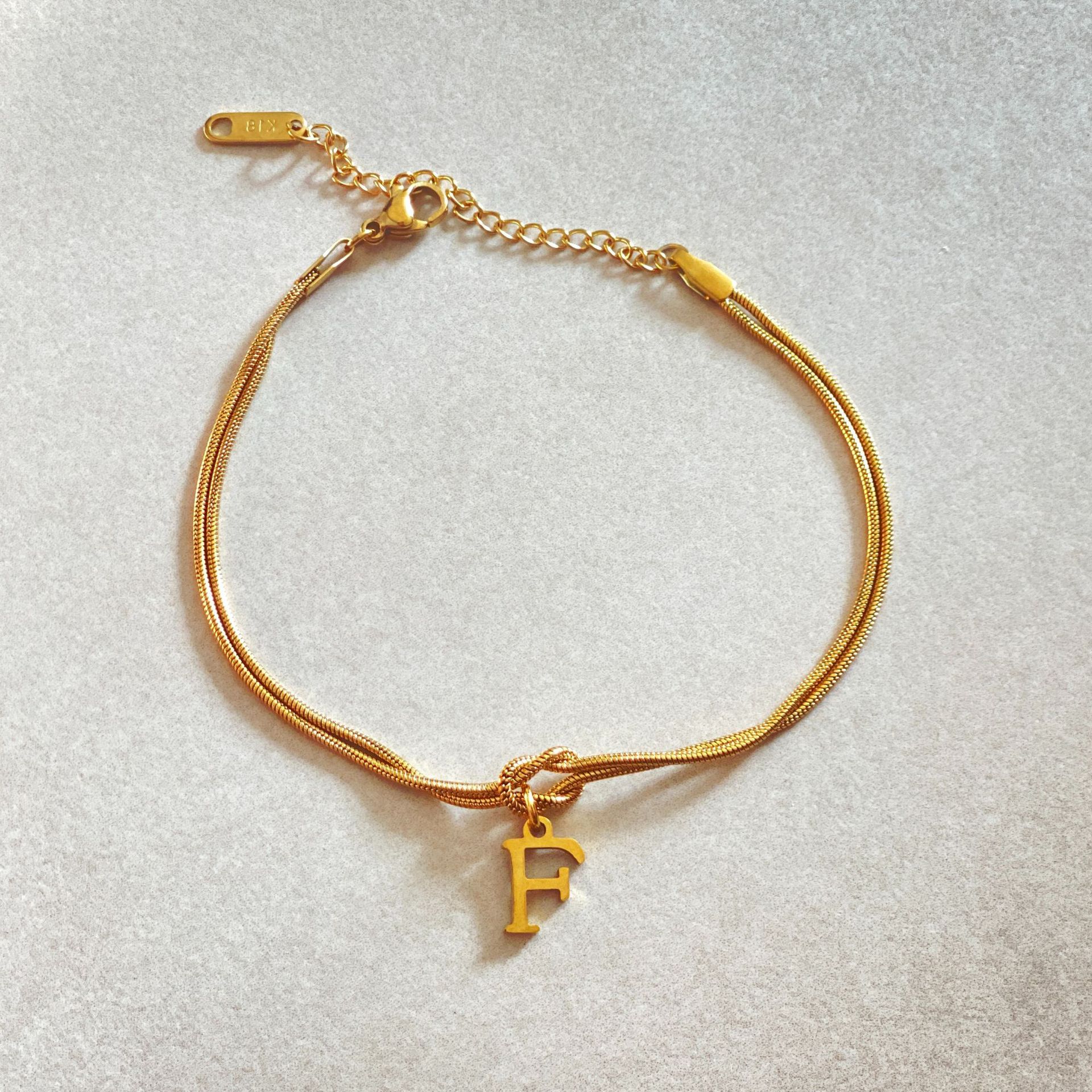 Gold Love Knot Initial bracelet, Elegant Stainless steel chain jewelry