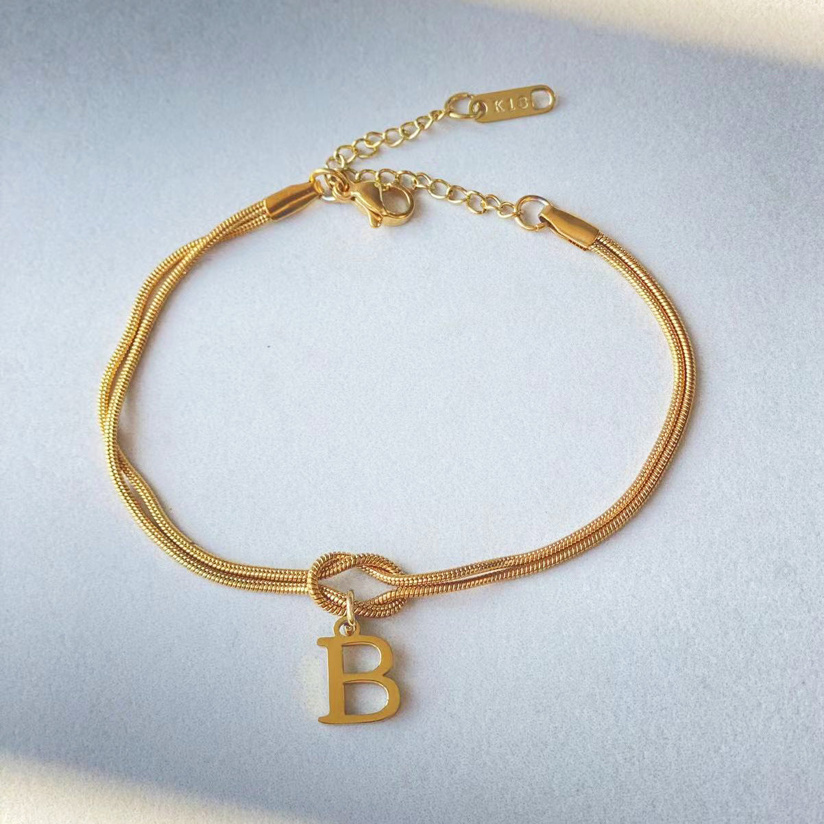 Gold Love Knot Initial bracelet, Elegant Stainless steel chain jewelry